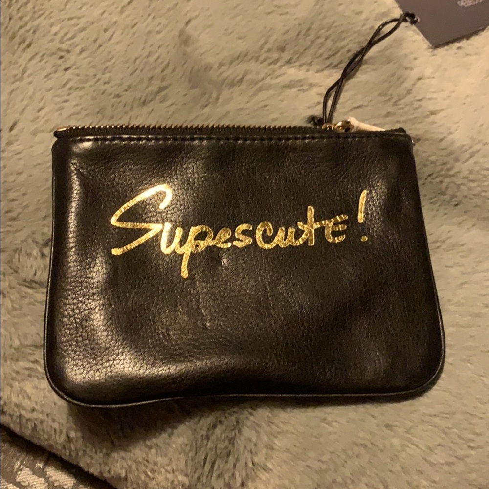Rebecca Minkoff “Supes cute” wallet pouch!